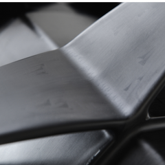 zoomed in look of rotobox bullet pro spoke with carbon strands